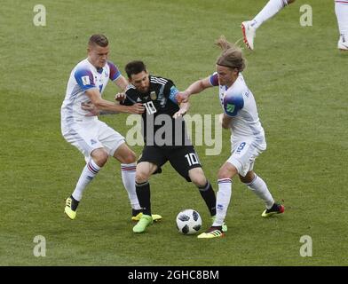Alfred Finnbogason and Birkir Bjarnason of Iceland tackle Lionel Messi of Argentina during the FIFA World Cup 2018 Group D match at the Spartak Stadium, Moscow. Picture date 15th June 2018. Picture credit should read: David Klein/Sportimage via PA Images Stock Photo