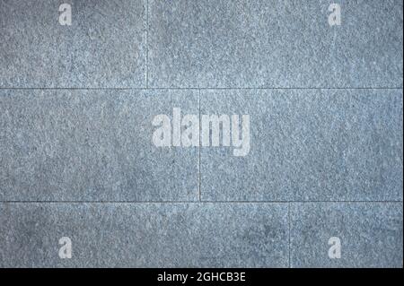 detail of a facade made of gray stone blocks Stock Photo