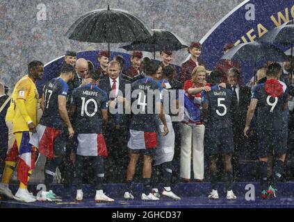 French President Emmanuel Macron hugs Kylan Mbappe of France during the FIFA World Cup 2018 Final at the Luzhniki Stadium, Moscow. Picture date 15th July 2018. Picture credit should read: David Klein/Sportimage via PA Images Stock Photo