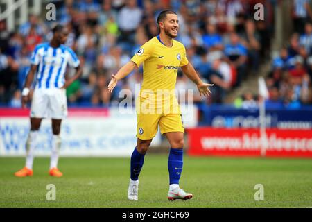 Chelsea's Eden Hazard celebrates after Pedro's goal during the Premier League match at the John Smith's Stadium, Huddersfield. Picture date 11th August 2018. Picture credit should read: Matt McNulty/Sportimage via PA Images Stock Photo