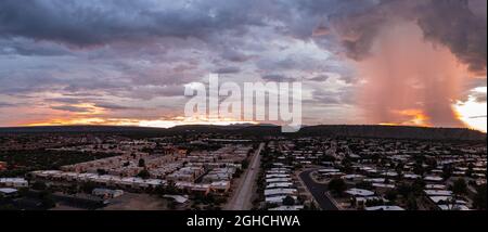 Monsoon rain over houses in Green Valley, Arizona Stock Photo