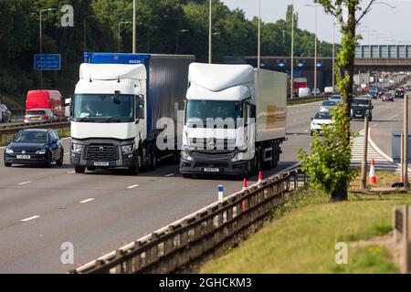 Lorries,trucks, and HGVs on the M1 motorway at Leicester Forest service station. Stock Photo