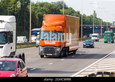 Lorries,trucks, and HGVs on the M1 motorway at Leicester Forest service station. Stock Photo