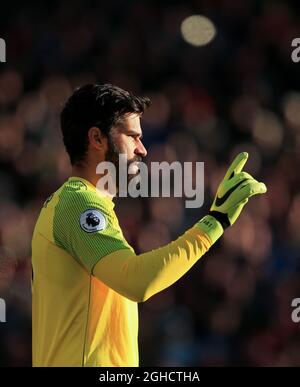 Liverpool's Alisson Becker gestures during the Premier League match at Anfield Stadium, Liverpool. Picture date 27th October 2018. Picture credit should read: Matt McNulty/Sportimage  via PA Images Stock Photo