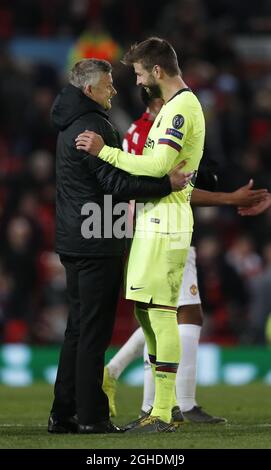 Ole Gunnar Solskjaer manager of Manchester United hugs Gerard Pique of Barcelona during the UEFA Champions League match at Old Trafford, Manchester. Picture date: 10th April 2019. Picture credit should read: Darren Staples/Sportimage via PA Images Stock Photo