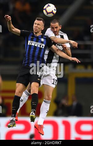 Ivan Perisic of Inter jumps above Joao Cancelo of Juventus to head the ball during the Serie A match at Giuseppe Meazza, Milan. Picture date: 27th April 2019. Picture credit should read: Jonathan Moscrop/Sportimage via PA Images Stock Photo