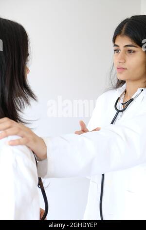 Female South Asian doctors from India talking to each other Stock Photo