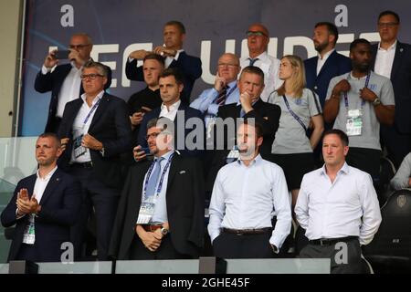 The England Full National team manager Gareth Southgate and his Assistant Steve Holland stand for the national anthems, also in the picture Leslie Reed, Roberto Rosetti and Nicola Rizzoli during the UEFA Under-21 Championship 2019 match at Dino Manuzzi, Cesena. Picture date: 21st June 2019. Picture credit should read: Jonathan Moscrop/Sportimage via PA Images Stock Photo