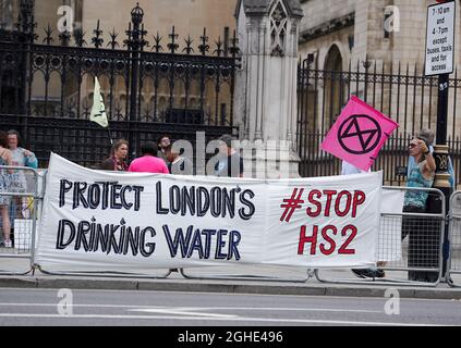 London, UK. 06th Sep, 2021. A banner is displayed reading, 'Protect London's Drinking Water, Stop HS2' during the, Welcome Back to Parliament and Die-In, demonstration. The self organizing group Westminster Rebellion organised a, Welcome Back to Parliament and a Die-In, at the Houses of Parliament in London to welcome MPs back after their summer recess and remind them that Westminster Rebellion have not gone away and neither has the climate and ecological emergency and the need for COP26 and forthcoming legislation to be taken seriously. Credit: SOPA Images Limited/Alamy Live News Stock Photo