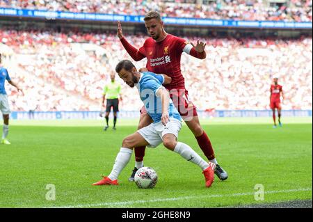 Bernardo Silva of Manchester City holds off Jordan Henderson of Liverpool during the The FA Community Shield match at Wembley Stadium, London. Picture date: 4th August 2019. Picture credit should read: Harry Marshall/Sportimage  via PA Images Stock Photo