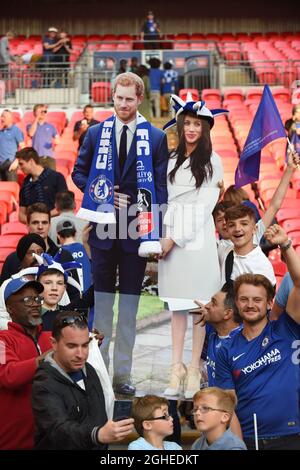 Chelsea fans hold aloft a cardboard Prince Harry and Meghan Markle after their win in the FA Cup Final - Chelsea v Manchester United, The Emirates FA Cup Final 2018, Wembley Stadium, London - 19th May 2018. Stock Photo