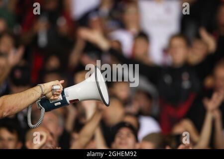 AN AC Milan Ultra use a megaphone to encourage fans to sing during the Serie  A match at Stadio Grande Torino, Turin. Picture date: 26th September 2019.  Picture credit should read: Jonathan Moscrop/Sportimage via PA Images Stock  Photo - Alamy