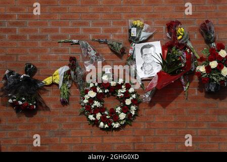 Floral tributes to former Manchester United goalkeeper Harry Gregg who was heralded as the hero of the Munich air disaster before the Premier League match against Watford at Old Trafford, Manchester. Picture date: 23rd February 2020. Picture credit should read: Darren Staples/Sportimage via PA Images Stock Photo