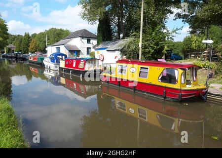 Govilon, Monmouthshire Wales - Canal boats on the Monmouthshire and Brecon canal beside Govilon Wharf, near Abergavenny in September 2021 Stock Photo