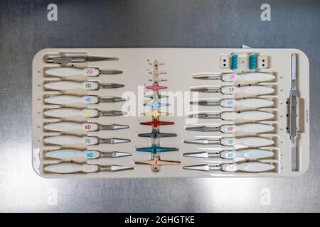 a tray contains the instruments for a finger joint prosthesis Stock Photo