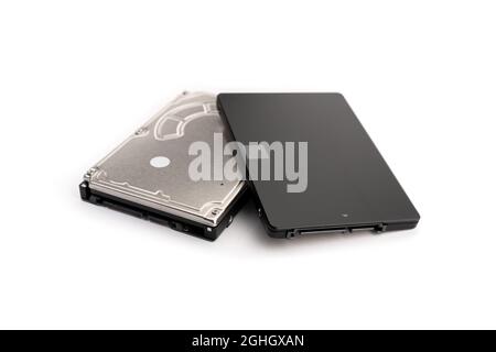 Modern SSD and old HDD Hard disk drive isolated on white background. Computer hardware data storage Stock Photo