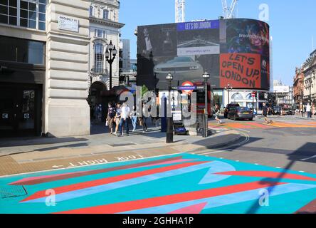 The Picadilly Art Takeover in Piccadilly Circus in summer 2021, with colourful pedestrian crossings, in London, UK Stock Photo