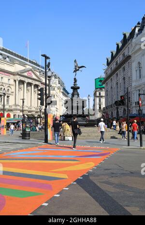 The Picadilly Art Takeover in Piccadilly Circus in summer 2021, with colourful pedestrian crossings, in London, UK Stock Photo