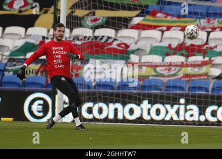 Danny Ward of Wales warms up during the FIFA World Cup qualifiers match at the Cardiff City Stadium, Cardiff. Picture date: 30th March 2021. Picture credit should read: Darren Staples/Sportimage via PA Images Stock Photo