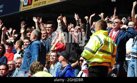 Supporters taunt each other during the Coca Cola Championship between Nottingham Forest v Derby County in London. Stock Photo