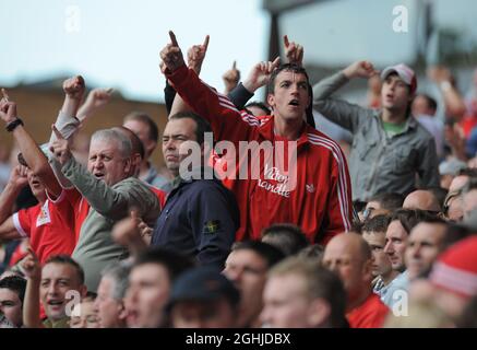 Fans taunt the opposition fans during the Coca Cola Championship between Nottingham Forest and the Derby County in London. Stock Photo