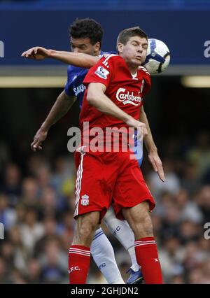 Chelsea's Michael Ballack tussles with Liverpool's Steven Gerrard during the Barclays Premier League match between Chelsea v Liverpool at Stamford Bridge in London. Stock Photo