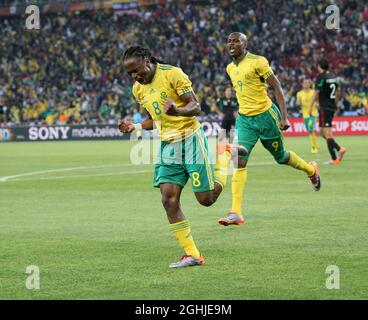 South Africa s Siphiwe Tshabalala Celebrates After Scoring The 1 0 south-africa-s-siphiwe-tshabalala-celebrates-after-scoring-the-1-0