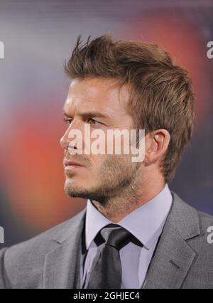 England's David Beckham takes his seat on the bench during the FIFA World Cup 2010, Group C match between England and USA at Royal Bafokeng Stadium, Rustenburg, South Africa. Stock Photo