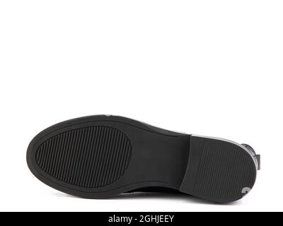 black leather chelsea boots with black elasticated side details, pattern details and black rubber sole. Isolated on white background. Fashion shoes. Stock Photo