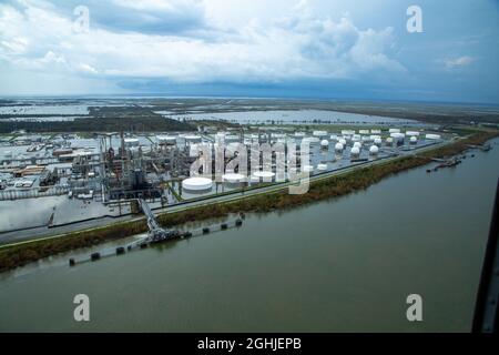 Belle Chasse, United States of America. 01 September, 2021. Aerial view of a flooded oil refinery caused by Category 4 Hurricane Ida along the west bank of the Mississippi River at Plaquemines Parish September 3, 2021 in Belle Chasse, Louisiana. Credit: Maj. Grace Geiger/U.S. Army/Alamy Live News Stock Photo