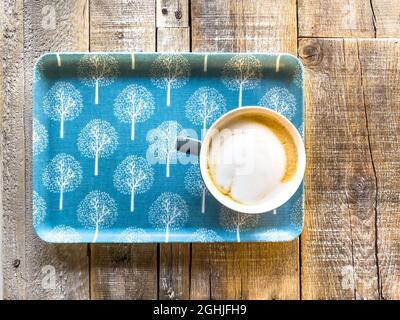 Coffee Cup On Blue Tray Stock Photo