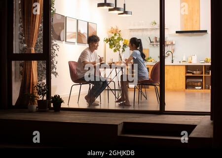 Happy young couple enjoying dinner Stock Photo