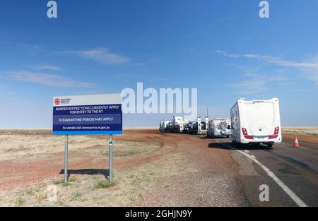 Vehicles queued for coronavirus screening at the Qld/NT border near Camooweal, Queensland, Australia. No PR Stock Photo