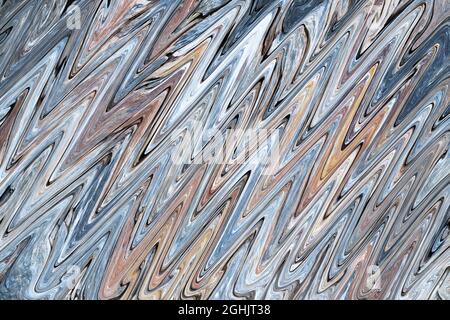 Abstract background texture of multi-colored diagonal zigzags. Top view. Stock Photo
