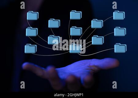 Hand holding folders icons - the concept of cloud computing Stock Photo