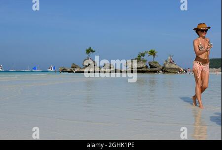 Willy's Rock by the white sand beach in Boracay, The Philippines. Stock Photo