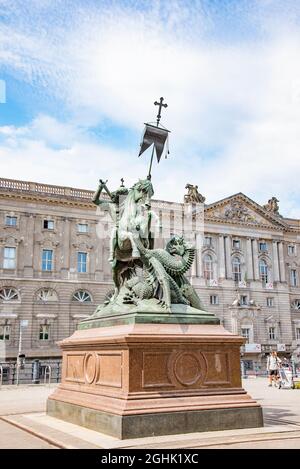 The very delicate 6m high statue of St. George and the Dragon Statue located in the historical Nikolai Quarter of Berlin. Taken in Berlin, Germany on Stock Photo