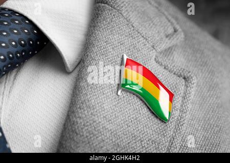 Metal badge with the flag of Bolivia on a suit lapel Stock Photo