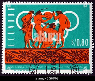 ECUADOR - CIRCA 1966: a stamp printed in the Ecuador shows discus and javelin, history of summer Olympics, circa 1966 Stock Photo