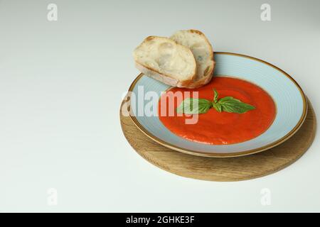 Soup Gazpacho with bread on white background Stock Photo