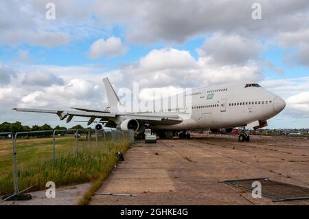 Retired Boeing 747 Jumbo jet airliner plane stored pending scrapping at Manston Airport boneyard, TF-ARU formerly Air Atlanta Icelandic and Saudi Stock Photo