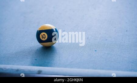 Selective focus on the red snooker ball or pool on the snooker table, Indoor sport Stock Photo