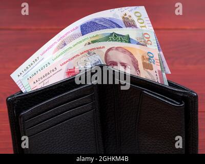 Georgian lari in the black wallet Stock Photo