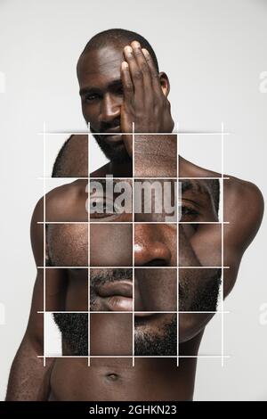 Creative art collage of young african man isolated over white background. Puzzled face on body Stock Photo