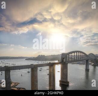 Royal Albert train Bridge designed by Isambard Kingdom Brunel against sunset in Plymouth, Devon, England, UK Stock Photo