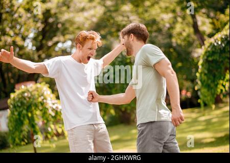 Two friends having fun in nature Stock Photo