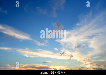 Beautiful colored cloudy evening sky. Sky with clouds at sunset. Abstract sky background. Stock Photo