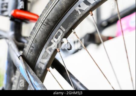 Air pressure valve on a bike tires rim Stock Photo