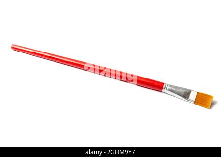 Red paintbrush isolated on white background Stock Photo