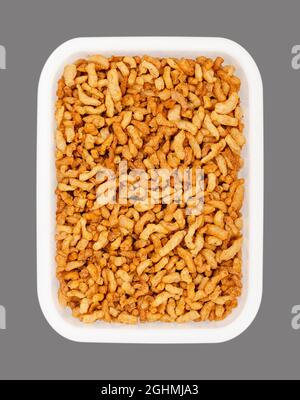 Vegan minced meat, in a white freezing box. Substitute and alternative for ground meat, based on seasoned pea protein. Stock Photo